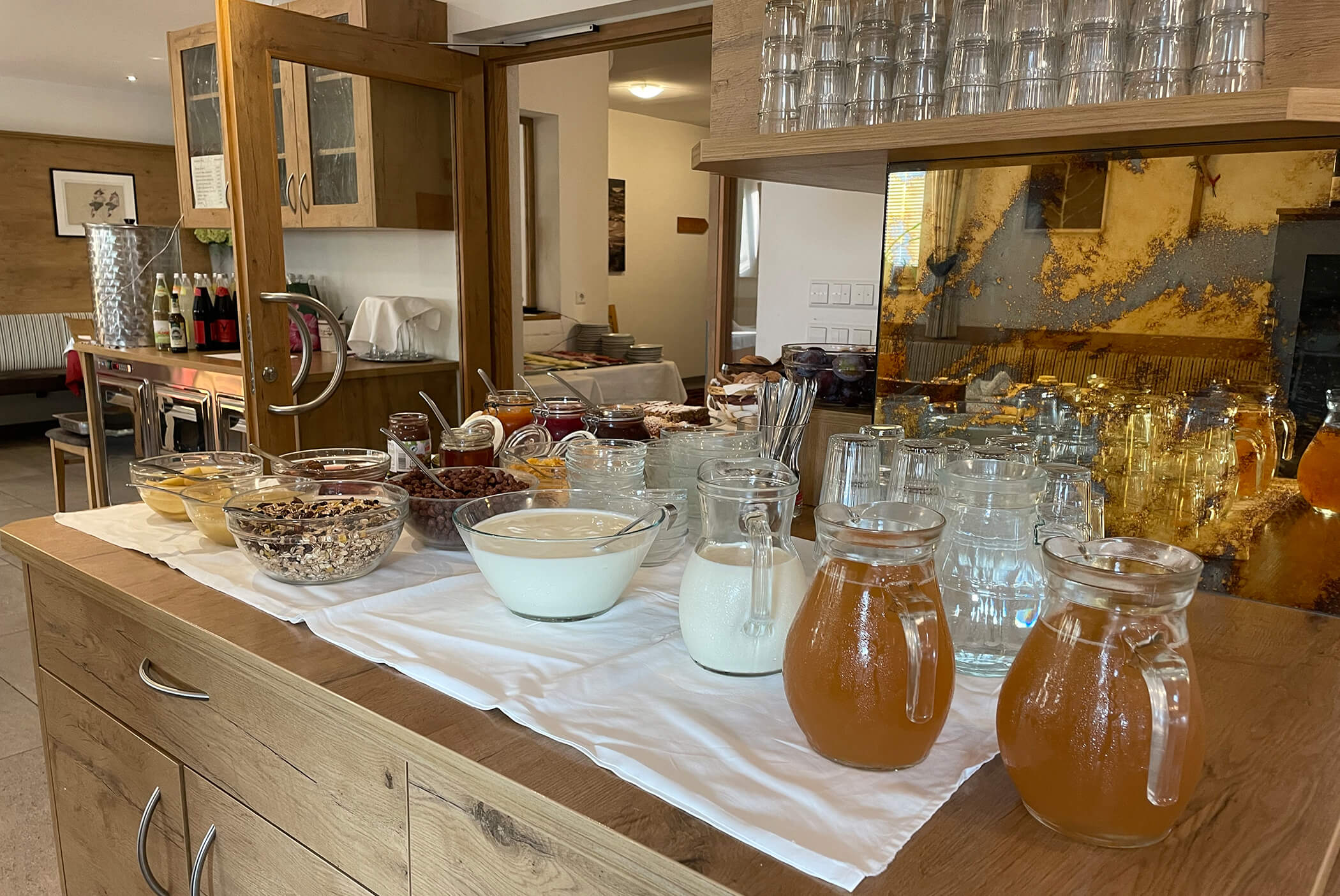 Breakfast buffet with various juices and yogurt - Schirmerhof